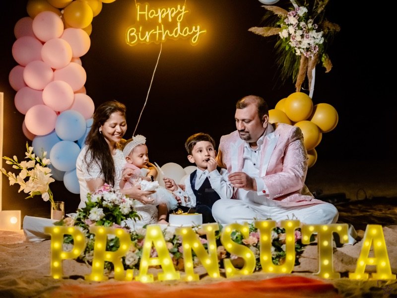 family celebrating birthday in goa captured by impression photography